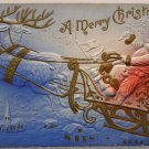 Antique Christmas Postcard Santa Claus in Sleigh Heavily Embossed Posted