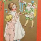Antique Christmas Postcard Santa Claus in Green Embossed Divided Unposted