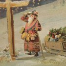 Christmas postcard Santa Claus Looking at Road Sign glossy unposted divided