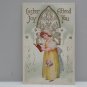 Antique Easter Postcard Little Girl Lilies Embossed Posted Divided
