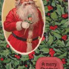Antique Christmas Postcard Santa Claus Holding a Joker Glossy Embossed Unposted