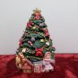 Christmas Tree Figurine Opens up to a Christmas Scene