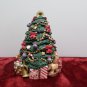 Christmas Tree Figurine Opens up to a Christmas Scene
