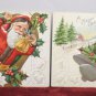 Two Antique Christmas Postcards Santa Claus Smoking Embossed Unposted