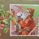 Antique Christmas Postcard Santa Claus Talking on Telephone Posted 1909