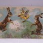 1907 Easter Postcard Rabbits and Chick Dancing on Easter Egg Posted Divided