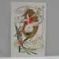 Antique Easter Postcard Rabbit Lillies Embossed Unposted Divided
