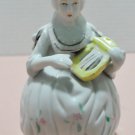 Vintage Figurine Woman Sitting in a Chair made in Japan