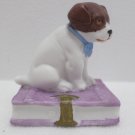 Bisque Figurine Dog Sitting on a Book made in Germany