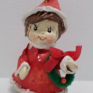 Christmas Figurine little girl paper mache red white