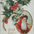 Antique Christmas postcard Santa Claus Holly Embossed Posted Divided