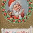 Christmas Postcard Santa Claus Smoking a Pipe Embossed Posted Divided