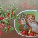 Antique Christmas Postcard Santa Claus Wearing Blue Mittens Holding Bag of Toys