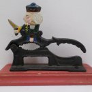 Vintage Cast Iron Nutcracker on a Wooden Base