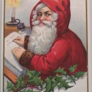 Antique Christmas Postcard Santa Claus Writing in Book Wearing Red with Hood