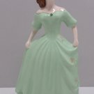 porcelain Figurine Woman Wearing a Long Green Dress
