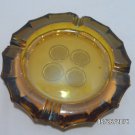 Ashtray Amber Glass with a Coin Design on the Bottom