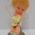 Christmas Tree Ornament Plastic Doll sitting on Brass Bell