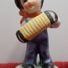 Cedo Figurine Porcelain Little Boy Playing an Accordion