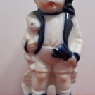 Porcelain Figurine Little Boy Holding a Rabbit made in Taiwan