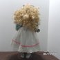 Porcelain Doll by The Brass Key Company Curly Blonde Hair with Pink Flowers