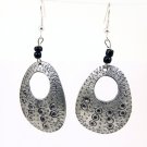 Product ID: 134     Etched Medium Aluminum Egg Shape Earrings  W Hole W 2 Black Beads