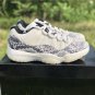 Men & Wmns Air Jordan 11 Low Snakeskin Light Bone University Red Sail Black