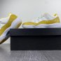 Men & Wmns Air Jordan 11 Low Yellow Snakeskin White Tour Yellow Sail