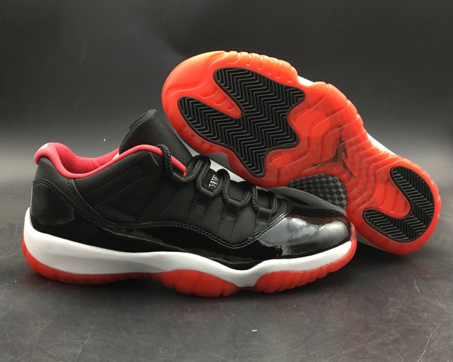 Men & Wmns Jordan 11 Low &acirc;��Bred&acirc;�� BlackVarsity Red