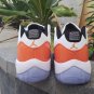 Air Jordan 11 Low White Black Orange Trance