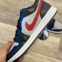 Jordan 1 Low 'Black Wolf Grey Gym Red'