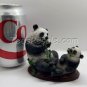 2 Pandas Eating Leaves. (parent and cub) (figurine)