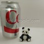 Little panda sitting by himself. (figurine)