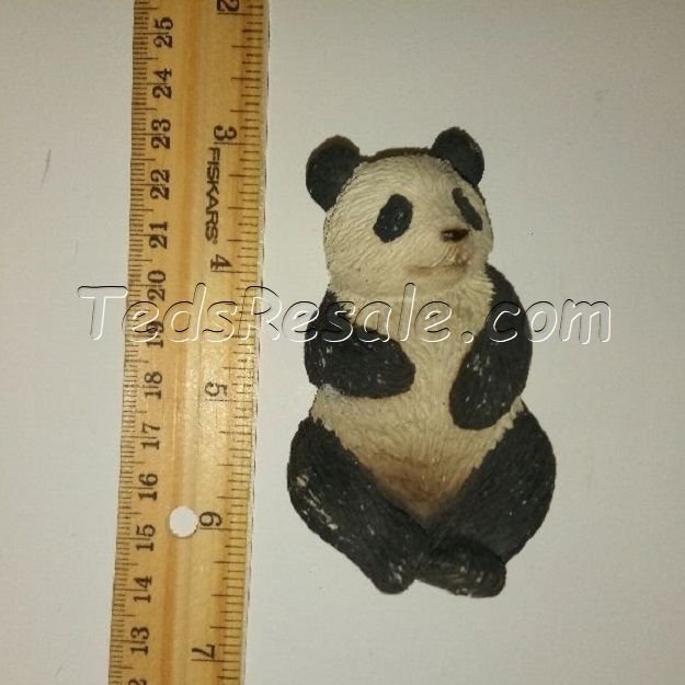Panda Figurine Laying on his Back.