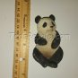 Panda Figurine Laying on his Back.