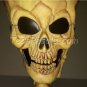Skeleton Hand Holding Up a Skull Head Goblet