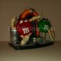 M&M Jukebox Dispenser with Red and Green on Dance Floor