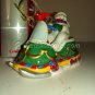 Snowman on a Colorful Musical Sled Musicbox