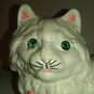 Kitty with bad eye, shelf figurine.