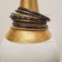 A Group of 16 Shades of Silver color Stacking Bracelets