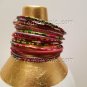 A Group of 21 Shades of Pink Stacking Bracelets