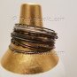 A Group of 17 Shades of Brown, Black and Silver color Stacking Bracelets