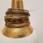 A Group of 23 Shades of Copper and Gold Stacking Bracelets