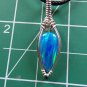 lab created opal wrapped in sterling silver