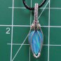 lab created opal wrapped in sterling silver