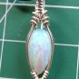 lab created opal wrapped in sterling silver