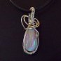 lab created opal wrapped in sterling silver