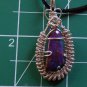 mohave turquoise pendant wrapped in sterling silver