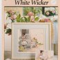 white wicker ** cross stitch booklet