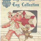 my antique toy collection to cross stitch